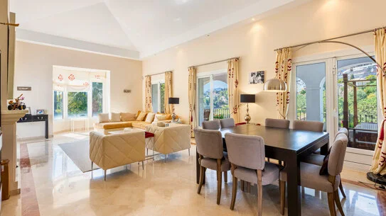 Living and dining room in warm light