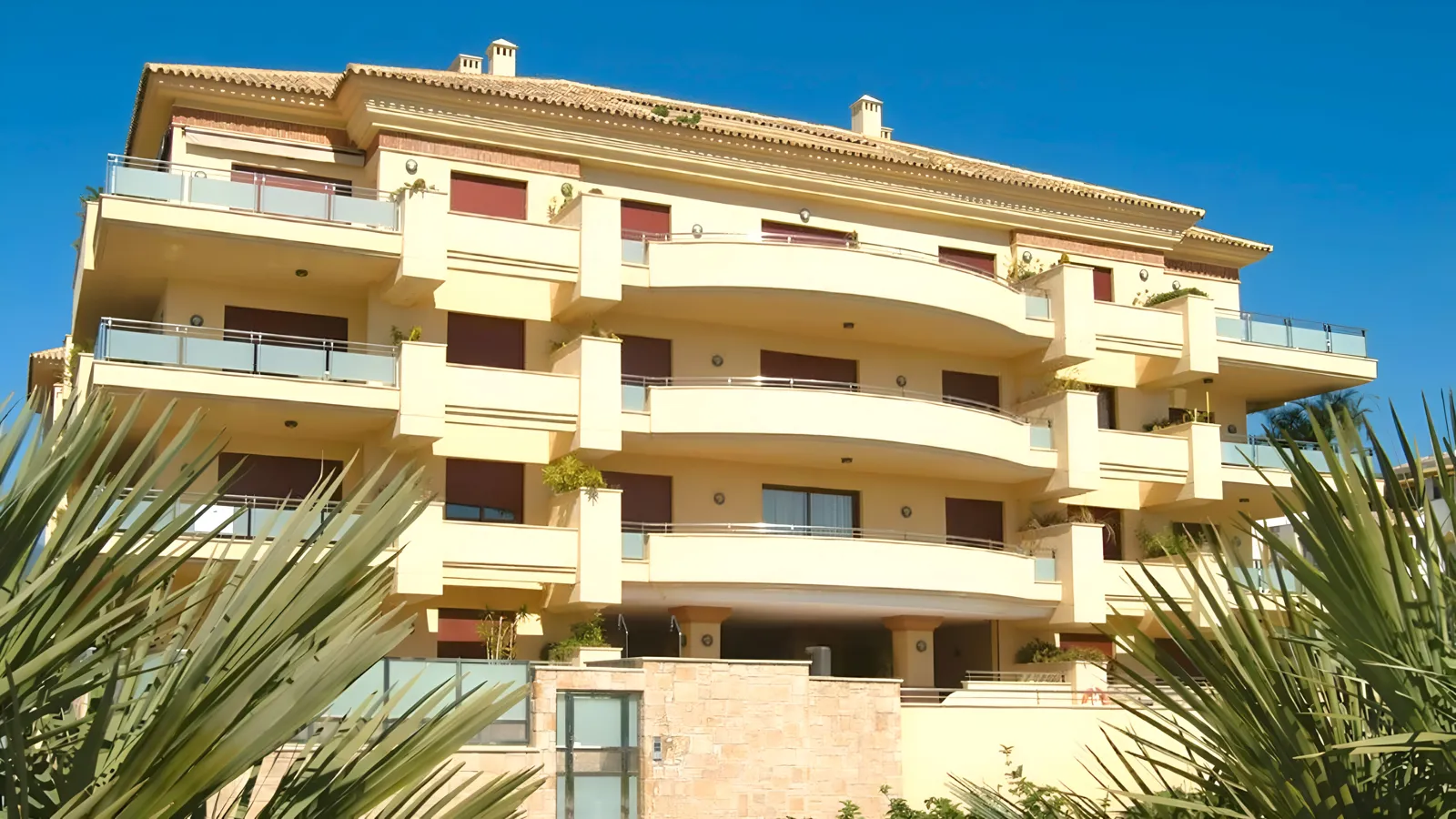 The Noray Playa building with its curved terraces