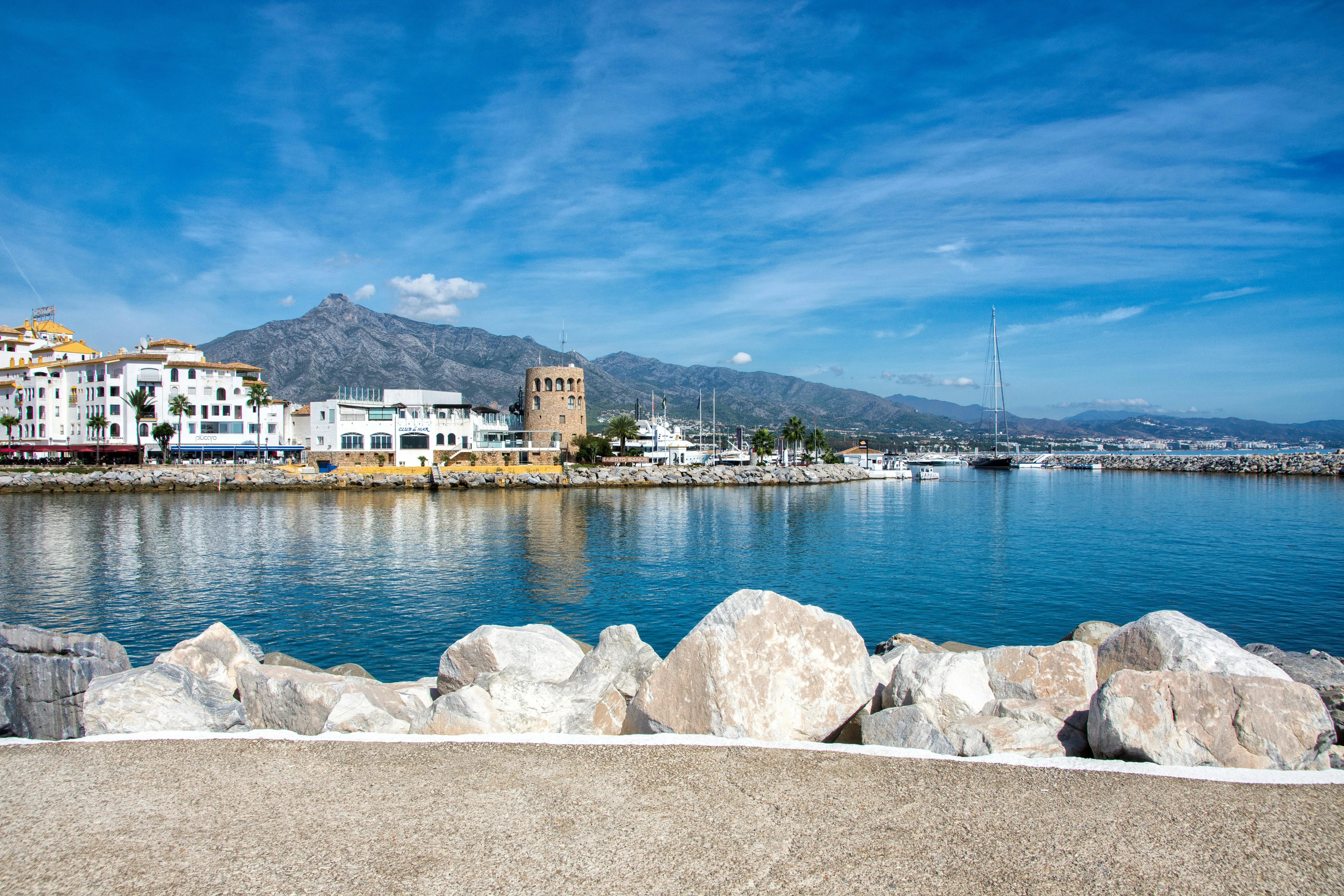 Puerto Banús harbour with its tower and La Concha mountain
